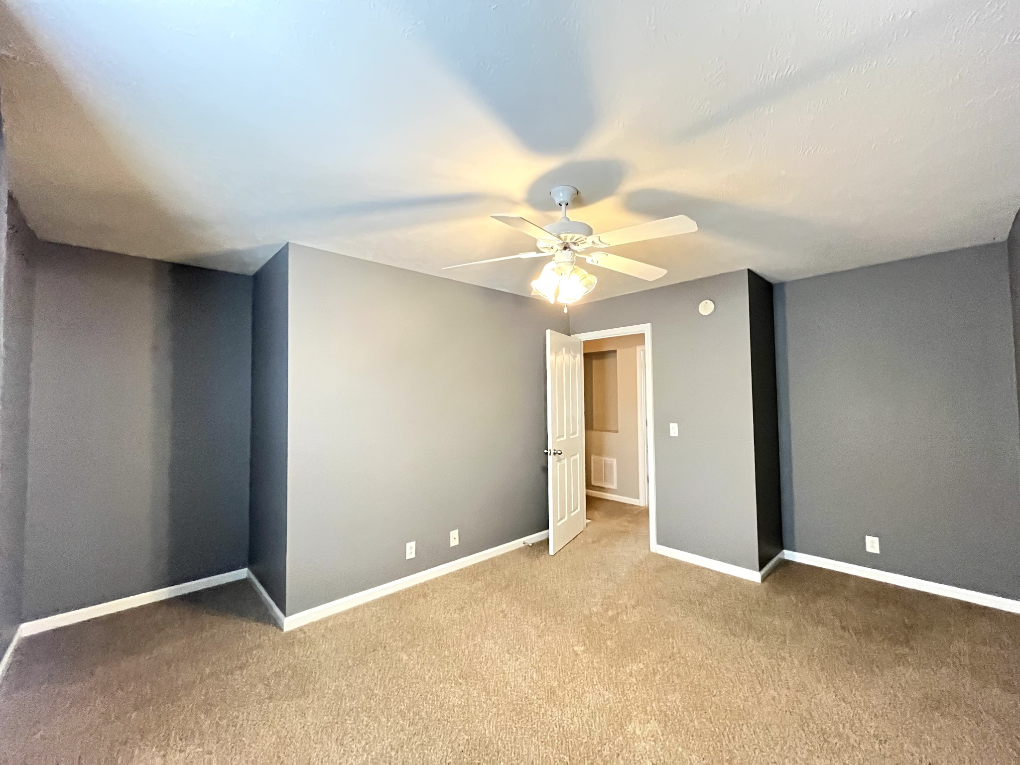 262 Arapaho Drive Murfreesboro, TN 37128 - Photo 18 of 24 a view of an empty room with a chandelier fan