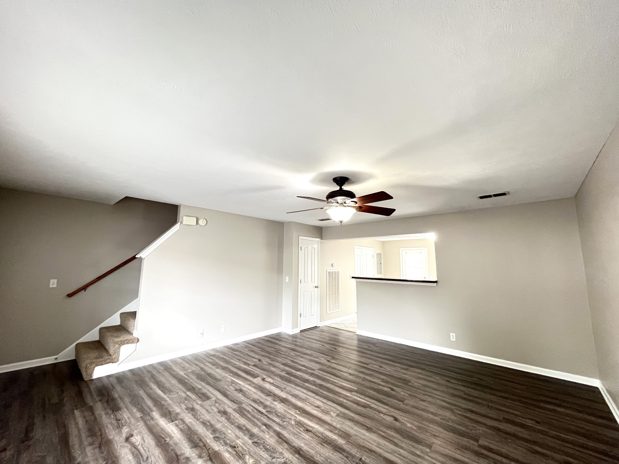 262 Arapaho Drive Murfreesboro, TN 37128 - Photo 4 of 24 a view of empty room with wooden floor and fan