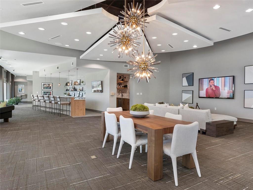 250 Pharr Road Northeast, Unit 514 Atlanta, GA 30305 - Photo 14 of 30 a view of a dining room with furniture