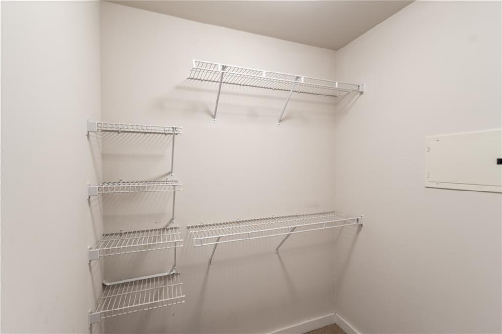 250 Pharr Road Northeast, Unit 514 Atlanta, GA 30305 - Photo 28 of 30 a view of an empty walk in closet