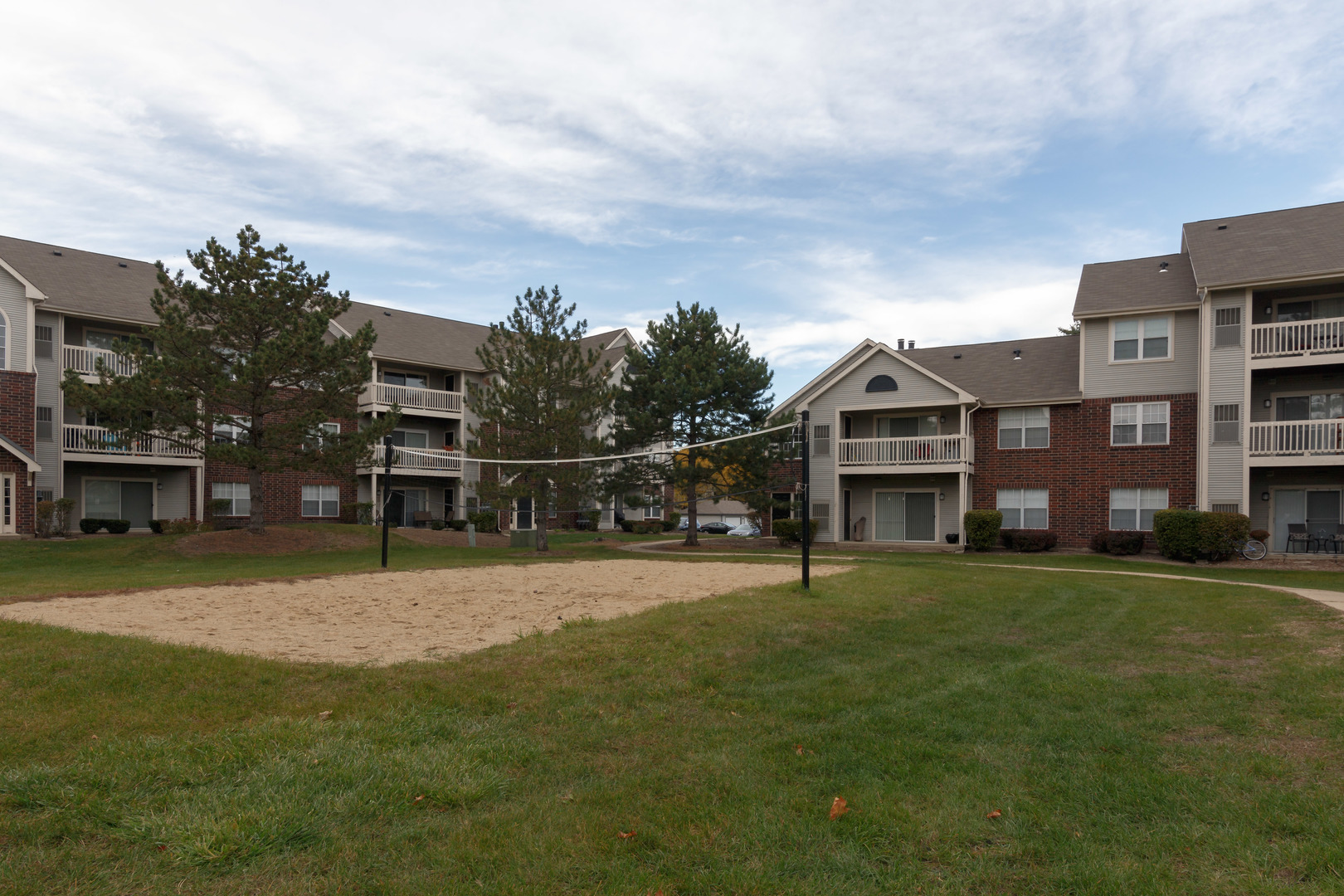 Undisclosed Address Wheaton, IL 60189 - Photo 12 of 17 a view of a big house with a big yard and large trees