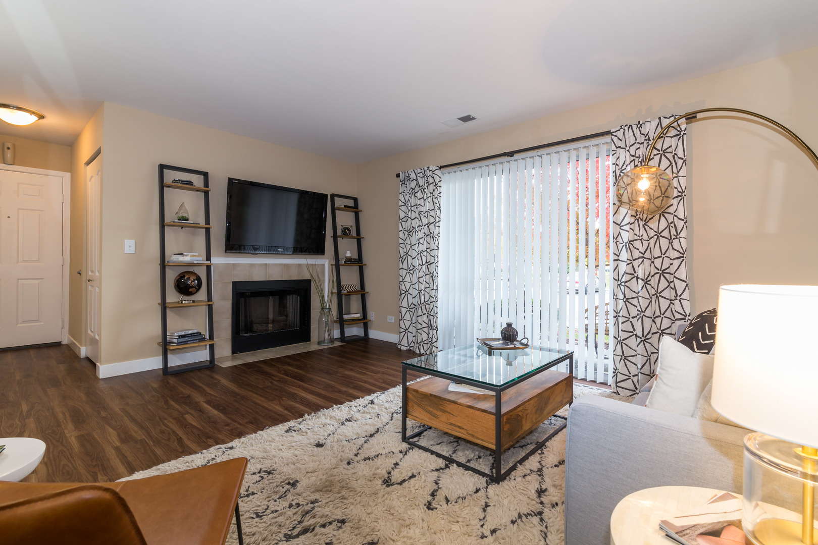 Undisclosed Address Wheaton, IL 60189 - Photo 4 of 17 a living room with furniture and a fireplace