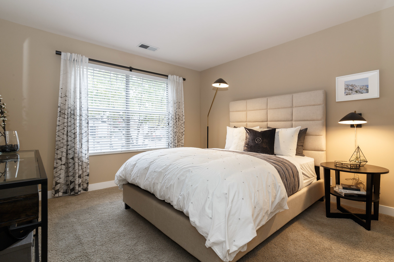 Undisclosed Address Wheaton, IL 60189 - Photo 10 of 17 a bed sitting in a bedroom next to a window