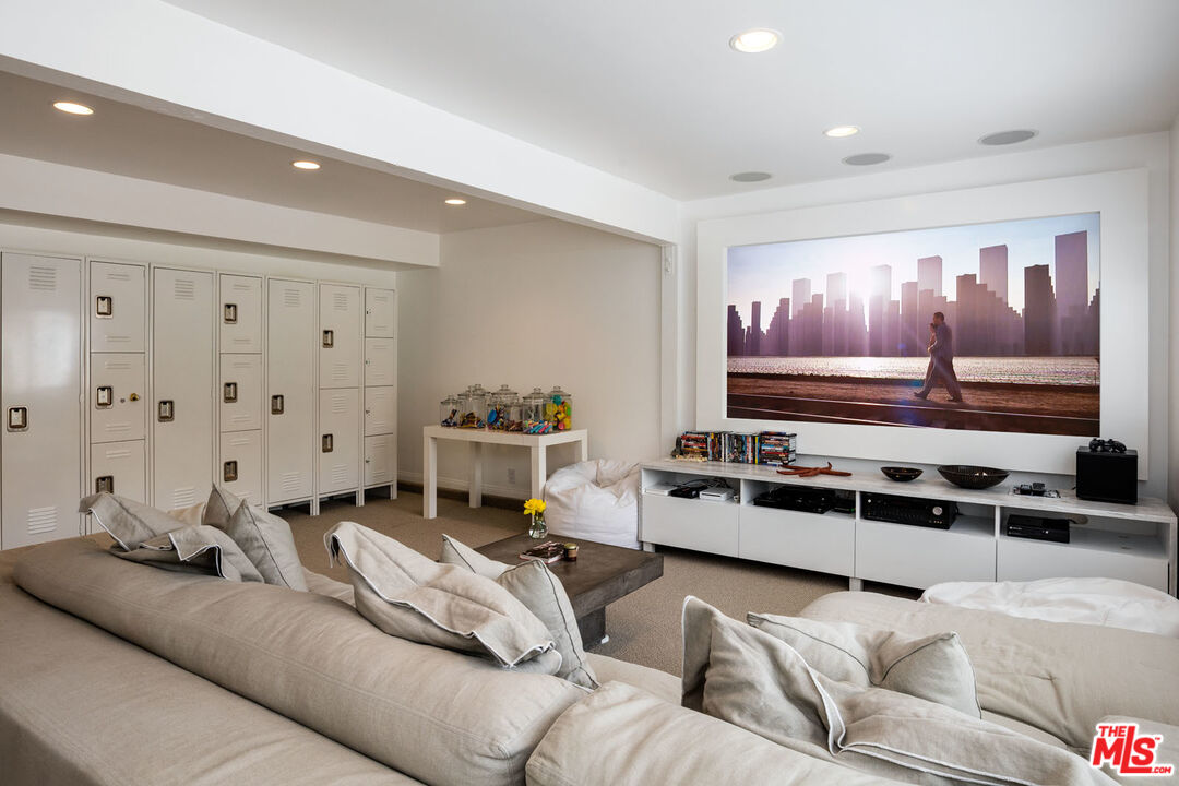 29225 Cliffside Drive Malibu, CA 90265 - Photo 14 of 33 a living room with furniture and kitchen view