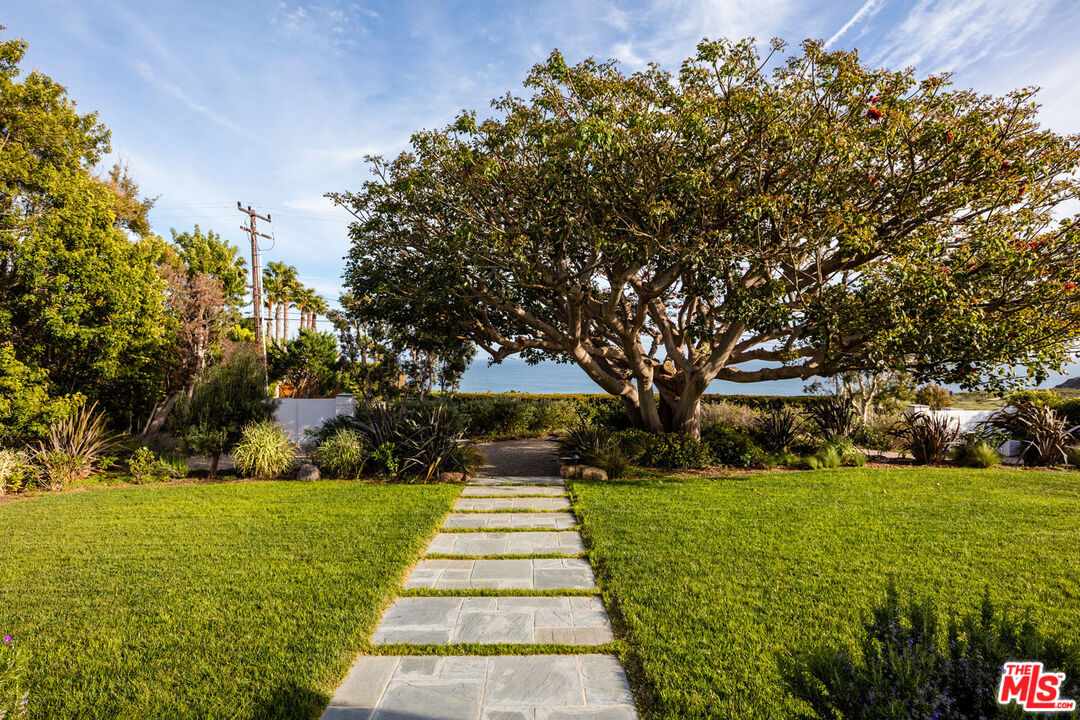 29225 Cliffside Drive Malibu, CA 90265 - Photo 17 of 33 a front view of building with yard