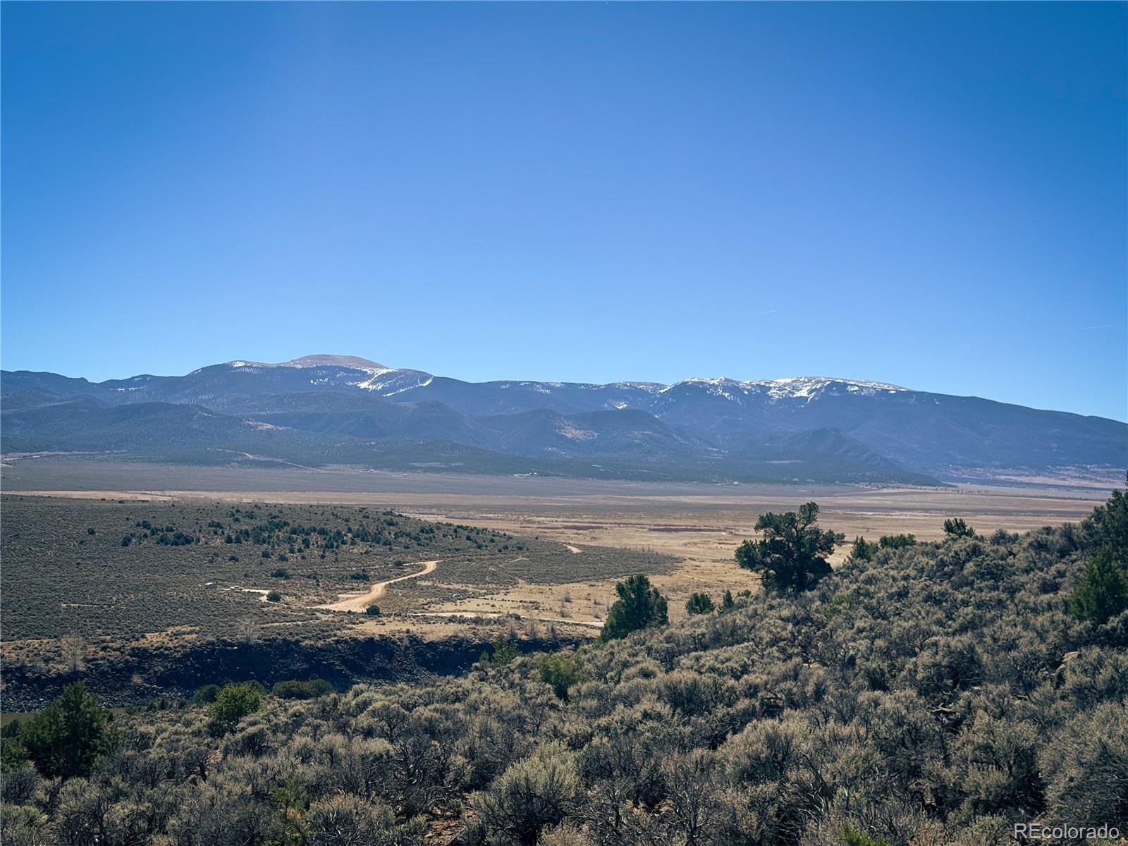 0 Sanchez Reservoir Road San Luis, CO 81152 - Photo 6 of 22 a view of lake with mountain