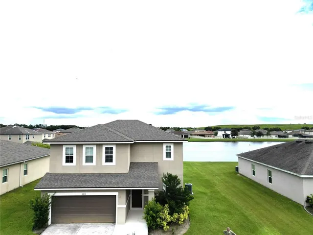 a view of a house with a garden