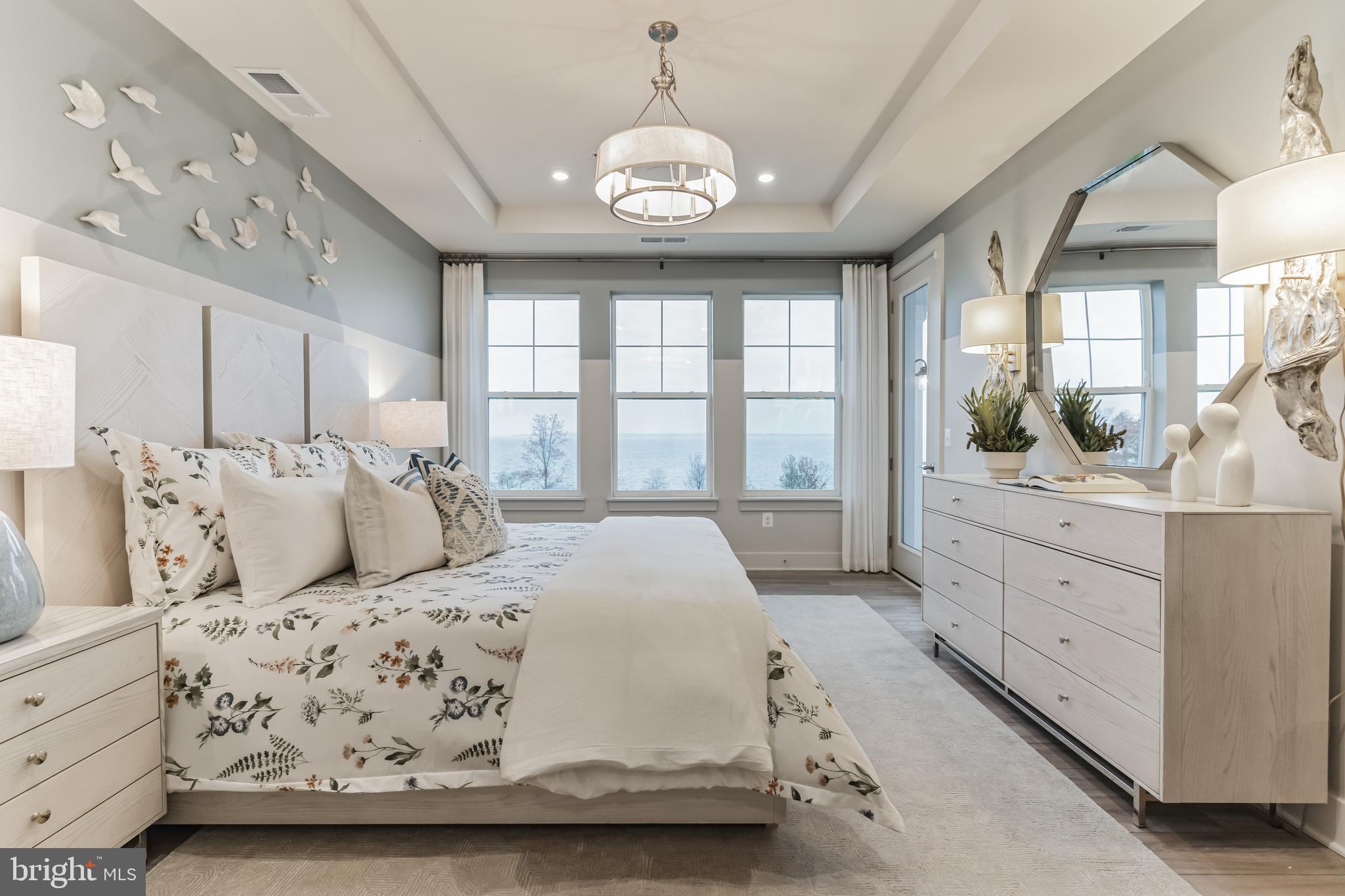 132 Wheelhouse Way Chester, MD 21619 - Photo 24 of 66 a bedroom with a large bed and a window