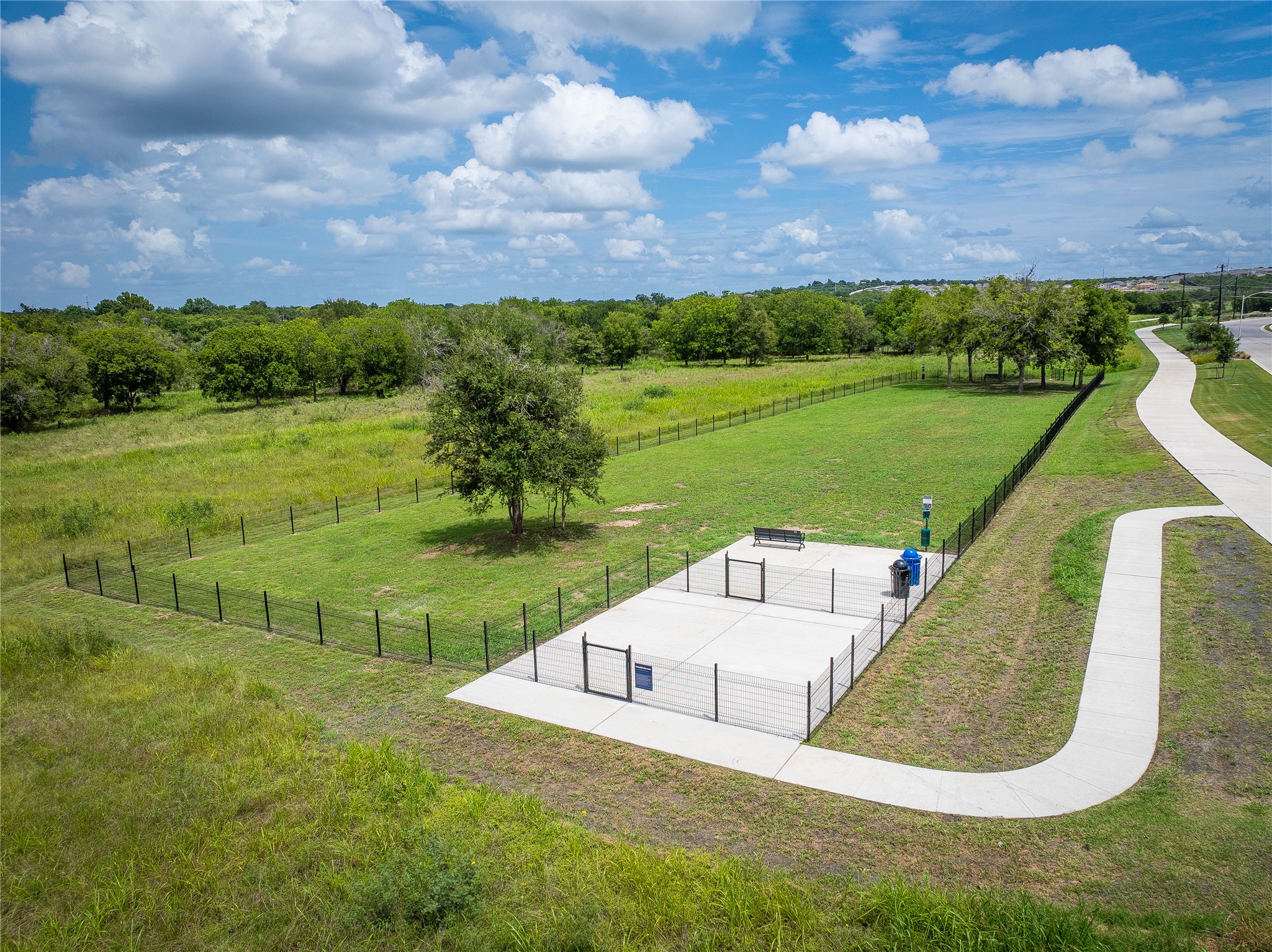 4513 Lava Island Drive Austin, TX 78747 - Photo 20 of 22 a view of a lake with a yard