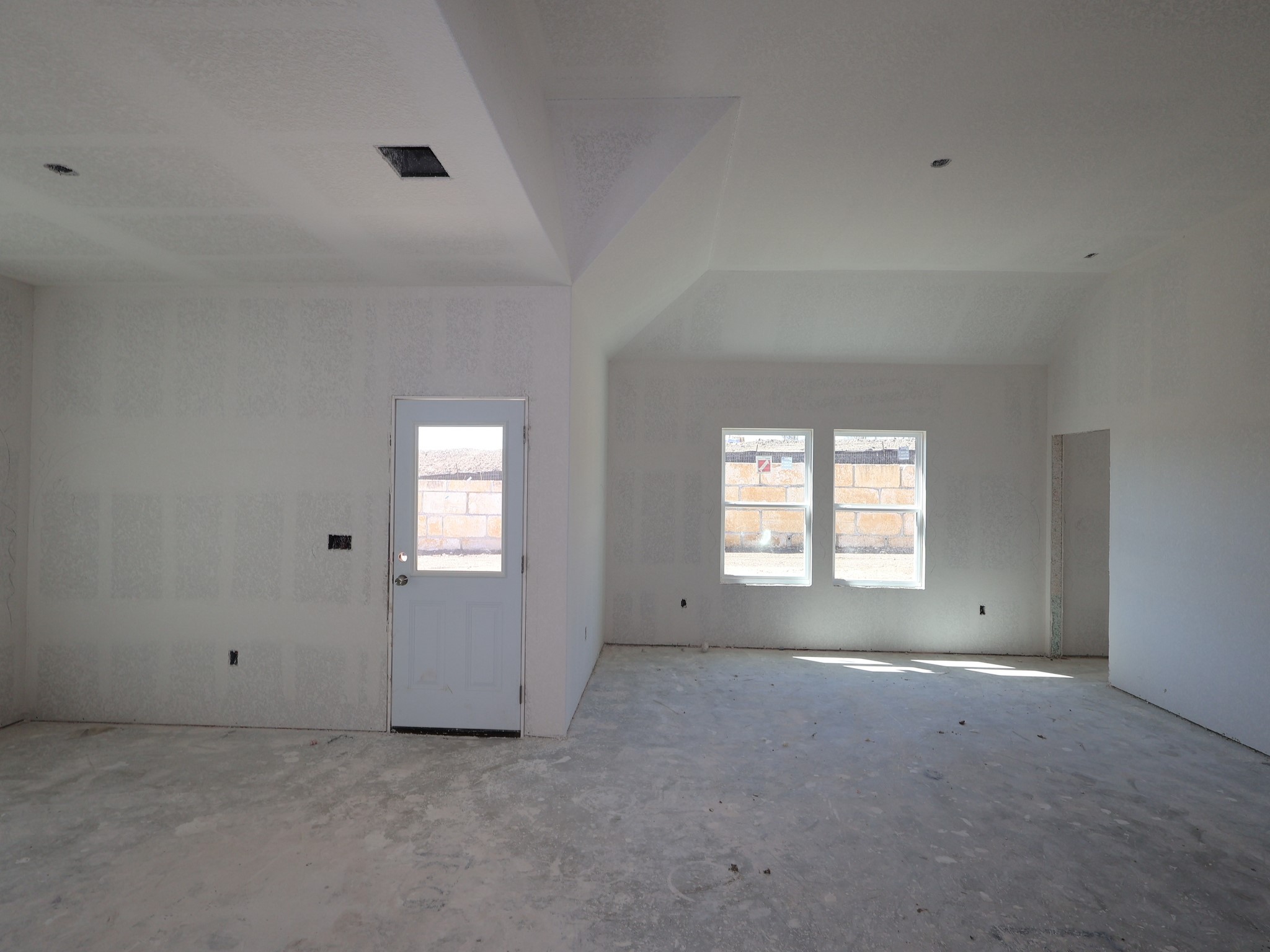 4513 Lava Island Drive Austin, TX 78747 - Photo 6 of 22 an empty room with windows