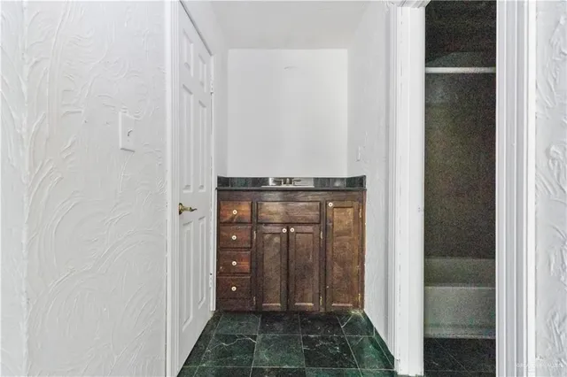 a view of a utility room with washer and dryer