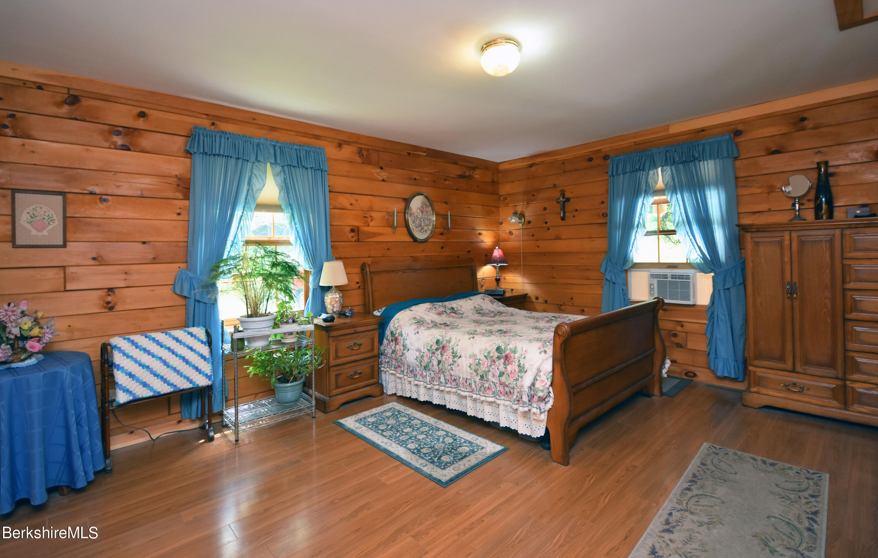 136 North Washington State Road Washington, MA 01223 - Photo 12 of 40 a bedroom with a bed and windows