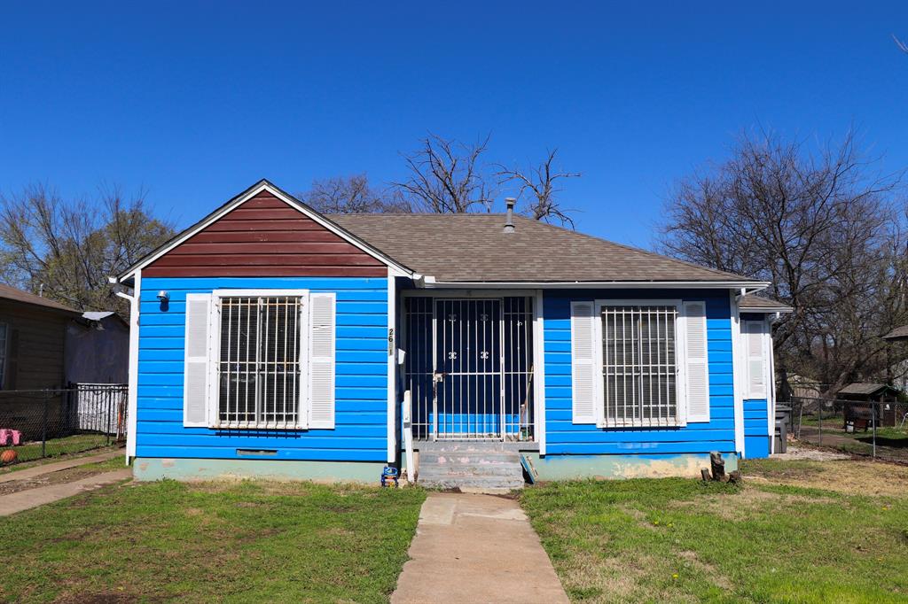 2651 Fordham Road Dallas, TX 75216 - Photo 1 of 1 Bungalow-style house featuring roof with shingles, a front lawn, and fence