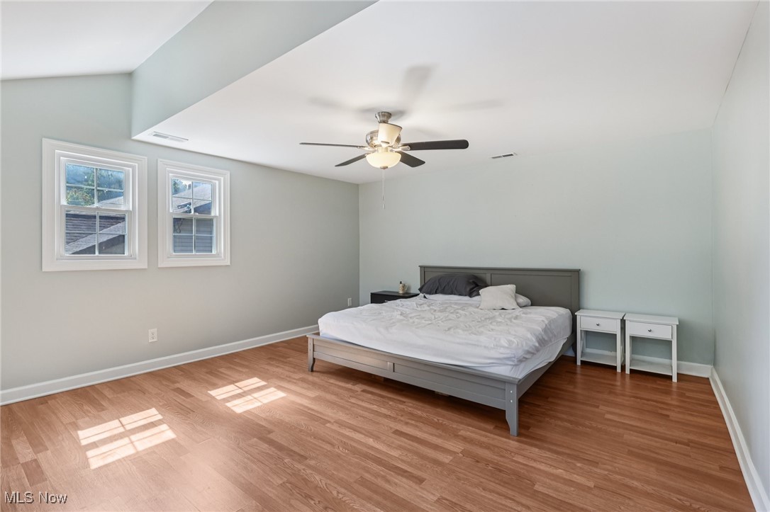 159 Eastland Road Berea, OH 44017 - Photo 17 of 38 Bedroom featuring light wood-style floors and ceiling fan