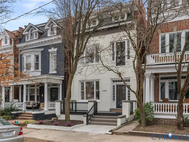 a view of a building with a tree