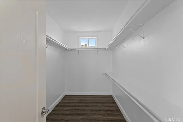 a view of an empty walk in closet