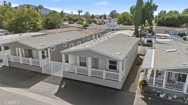 a aerial view of a house with a yard