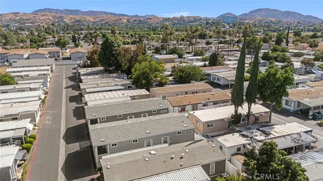 an aerial view of a city with lots of residential buildings