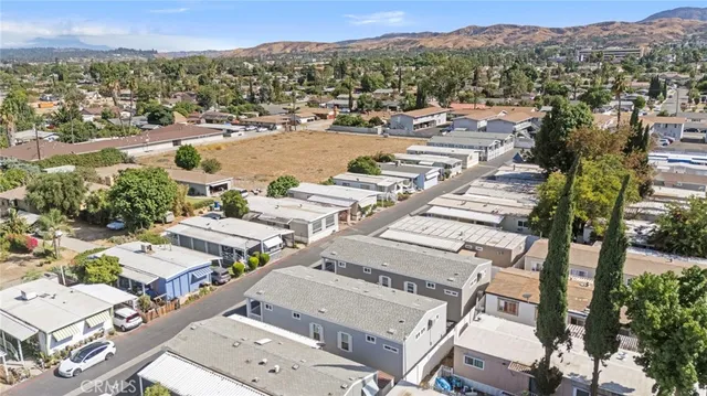an aerial view of a city with lots of residential buildings