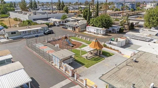 an aerial view of a swimming pool and mountain view