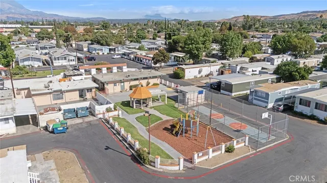 an aerial view of a chairs and table on the terrace