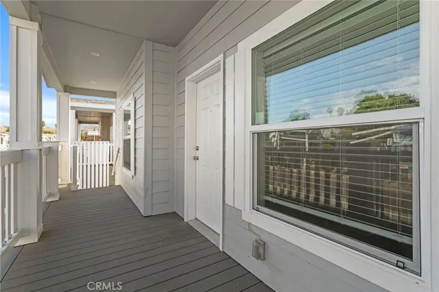 a view of a door and a window