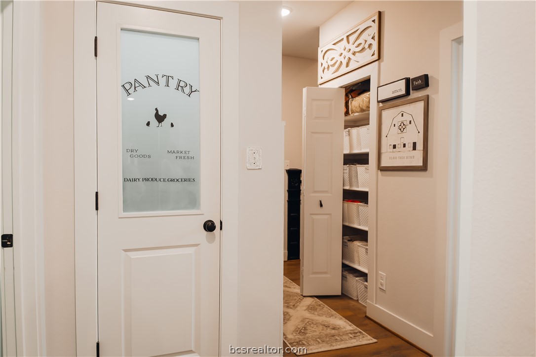 5036 Glory Road Bryan, TX 77808 - Photo 36 of 50 Additional pantry for your extra storage, hallway to 3rd bathroom and laundry area