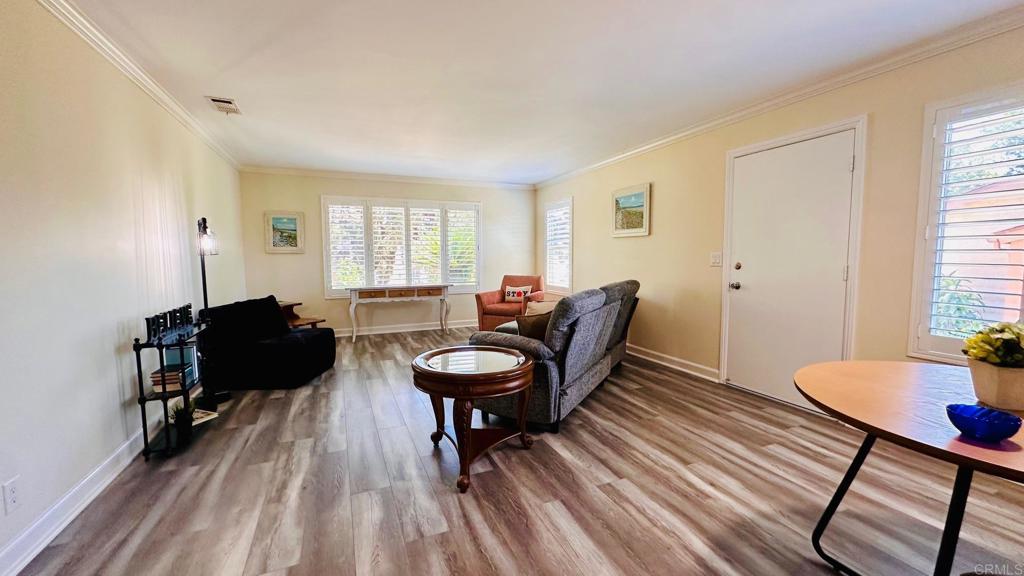 1034 Turnstone Way Oceanside, CA 92057 - Photo 11 of 28 a living room with furniture and a window