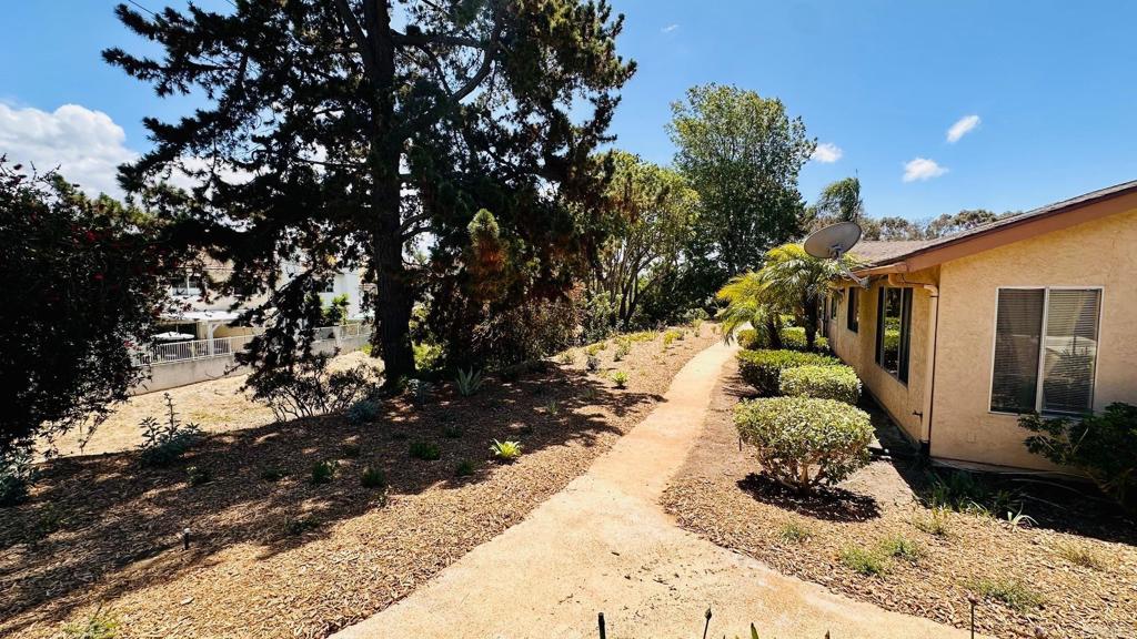 1034 Turnstone Way Oceanside, CA 92057 - Photo 20 of 28 a view of a backyard with pathway