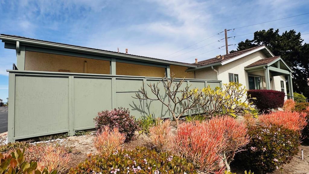 1034 Turnstone Way Oceanside, CA 92057 - Photo 2 of 28 a front view of a house with a yard
