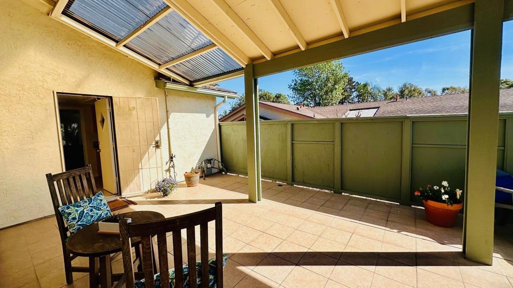 1034 Turnstone Way Oceanside, CA 92057 - Photo 23 of 25 a backyard of a house with table and chairs