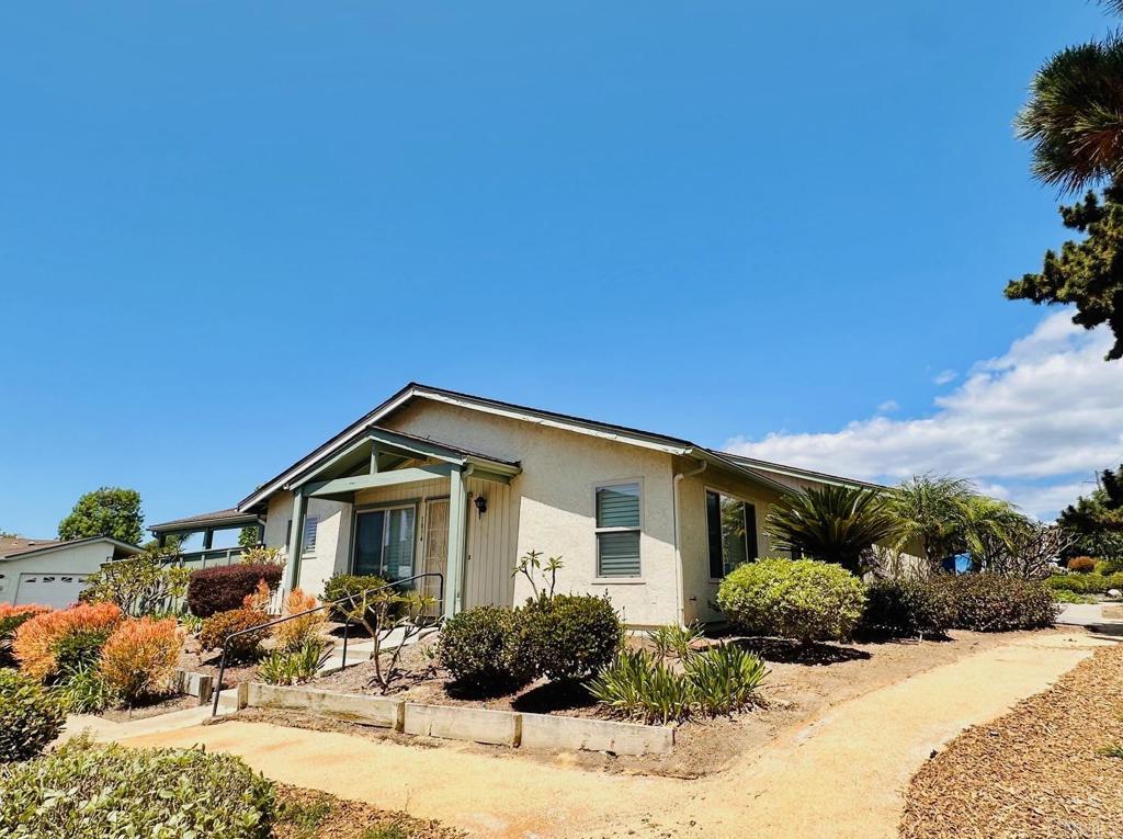 1034 Turnstone Way Oceanside, CA 92057 - Photo 28 of 28 a front view of a house with a yard