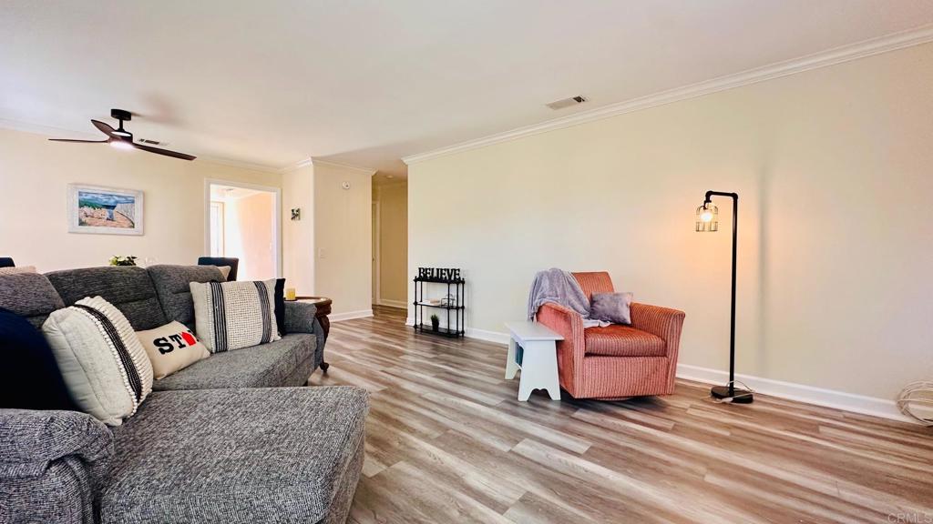 1034 Turnstone Way Oceanside, CA 92057 - Photo 9 of 25 a living room with furniture and a couch