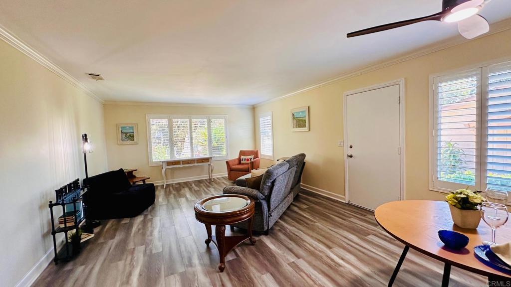 1034 Turnstone Way Oceanside, CA 92057 - Photo 10 of 28 a living room with furniture and a window