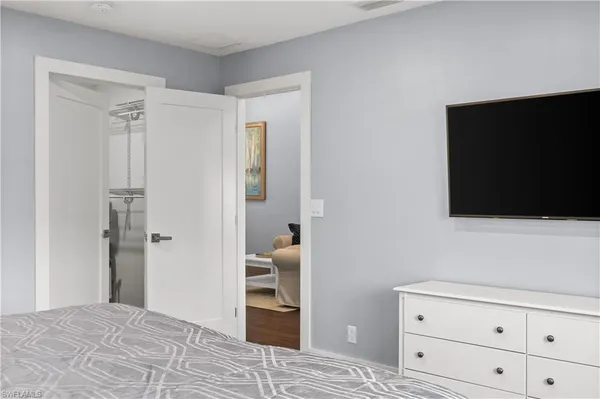 a kitchen with stainless steel appliances a refrigerator and a stove top oven
