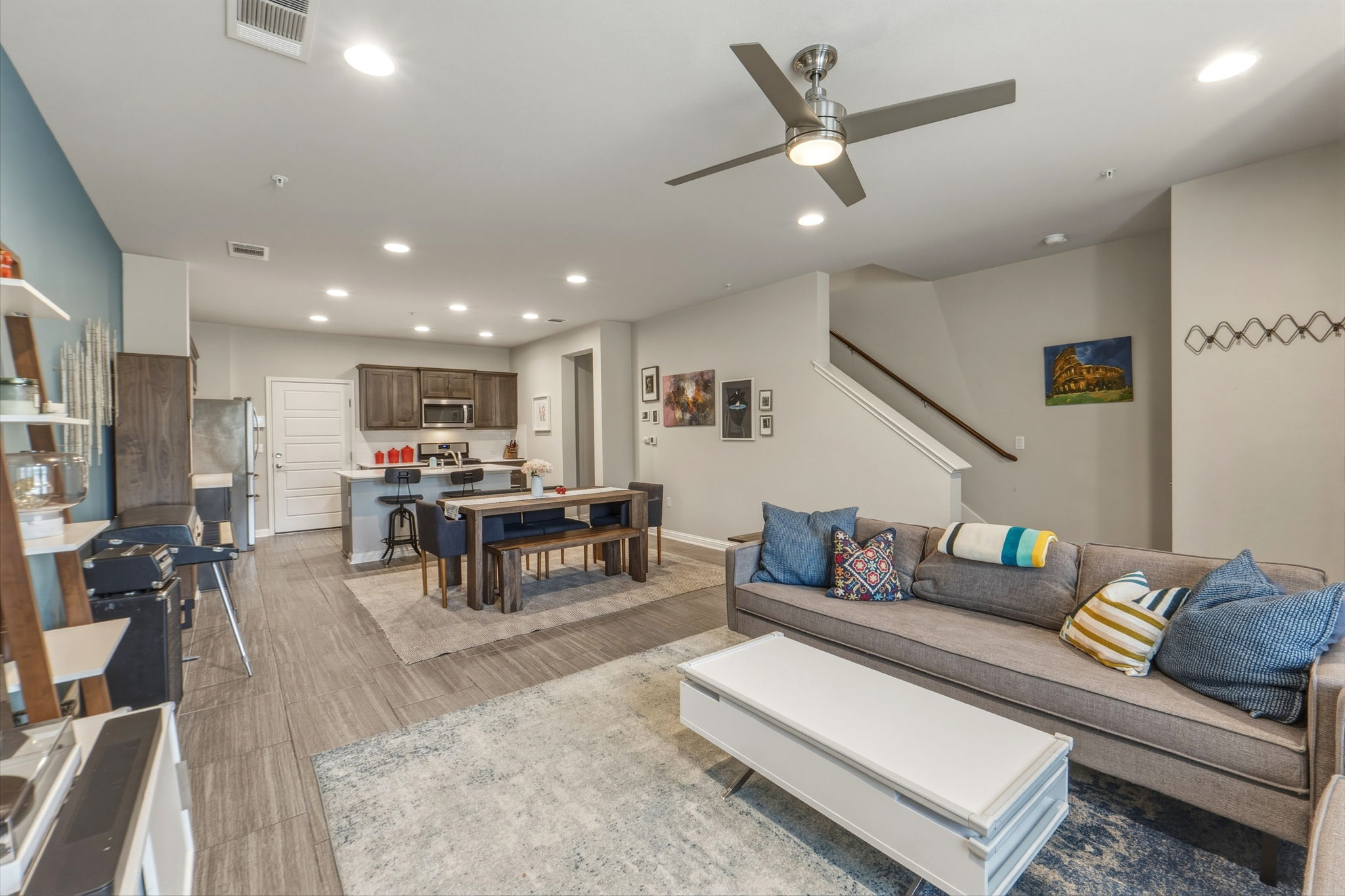 6814 East Riverside Drive, Unit 34 Austin, TX 78741 - Photo 5 of 26 a living room with furniture and kitchen view