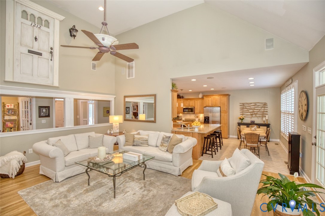 9960 Mill Pond Road Toano, VA 23168 - Photo 13 of 42 Vaulted ceiling with a ceiling fan, hardwood floor