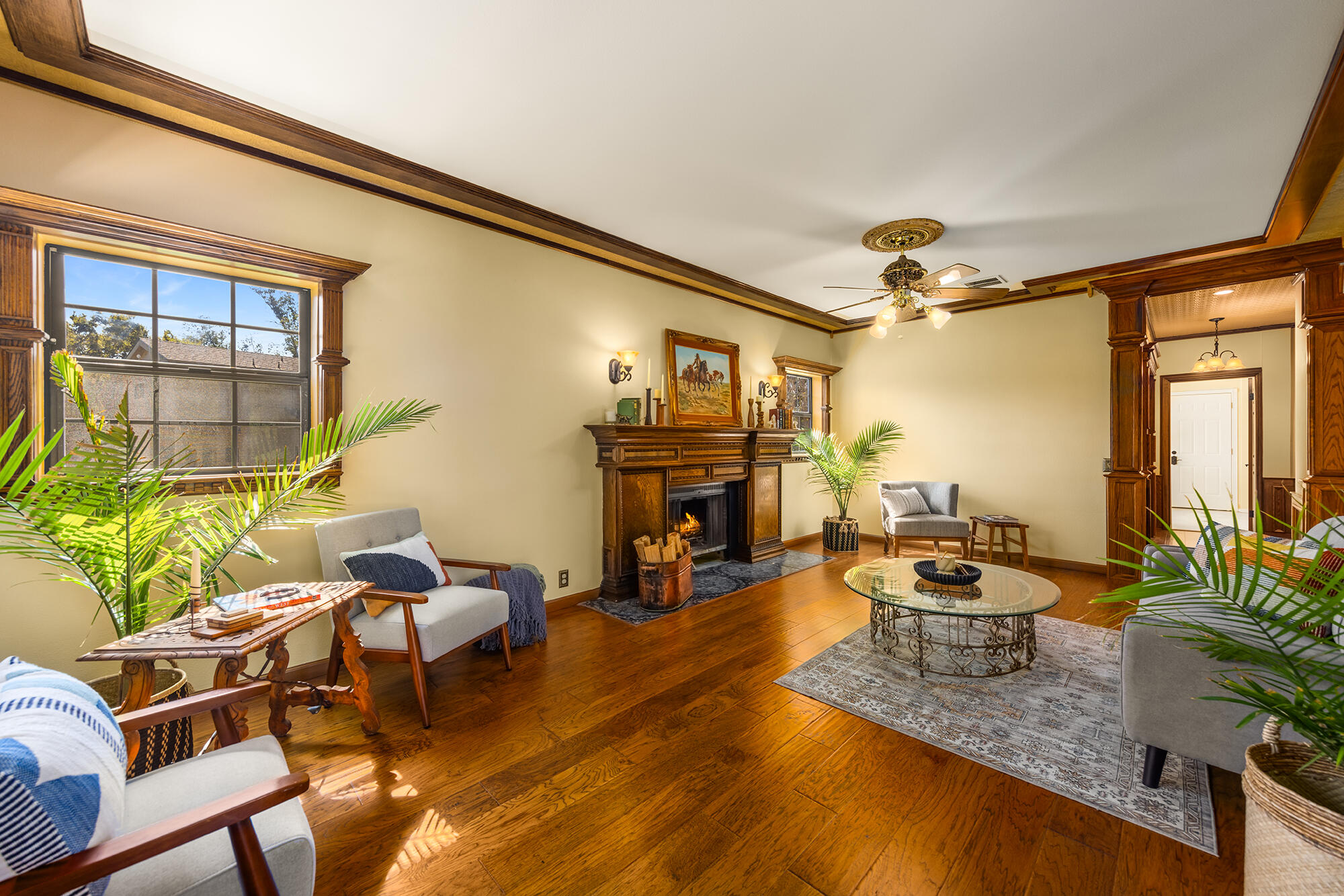 10480 Creek Road Oak View, CA 93022 - Photo 19 of 52 a living room with fireplace furniture and a large window
