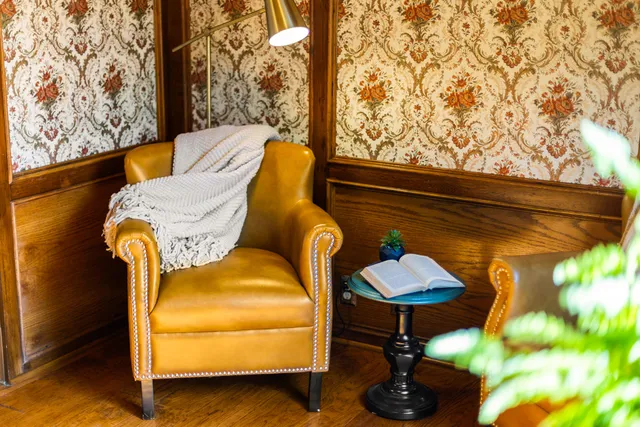 a living room with a couch and a table