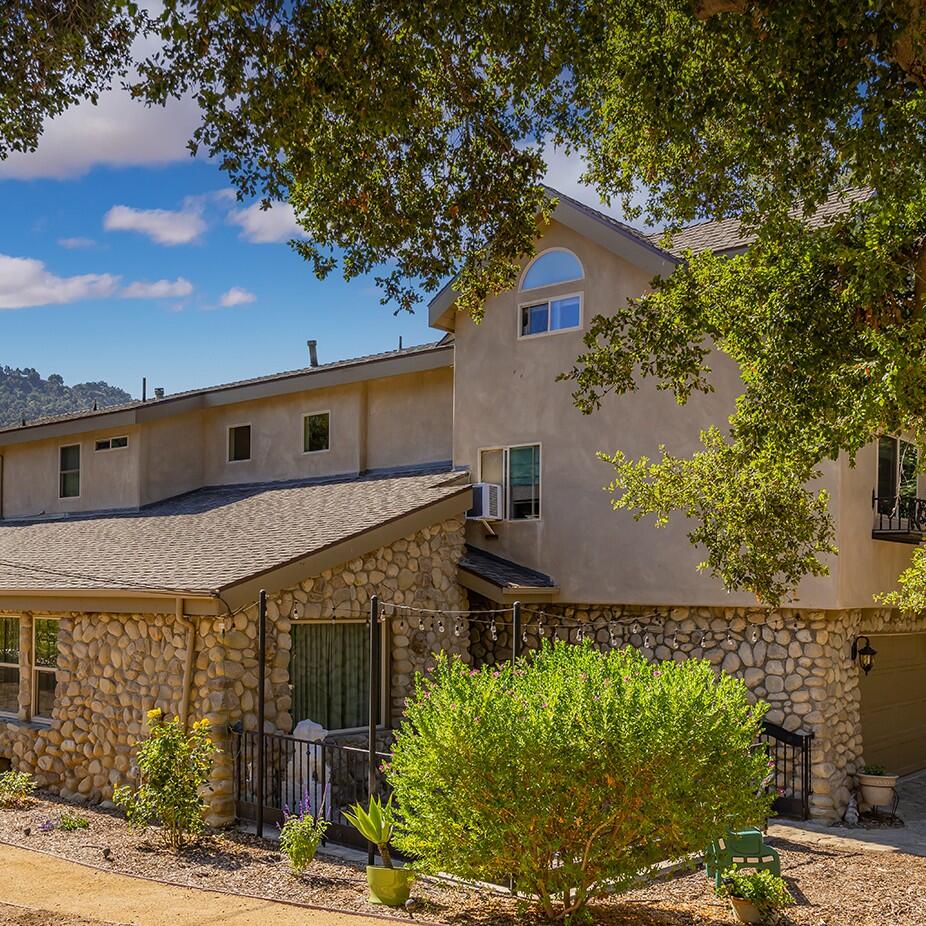 10480 Creek Road Oak View, CA 93022 - Photo 29 of 52 a front view of a house with garden