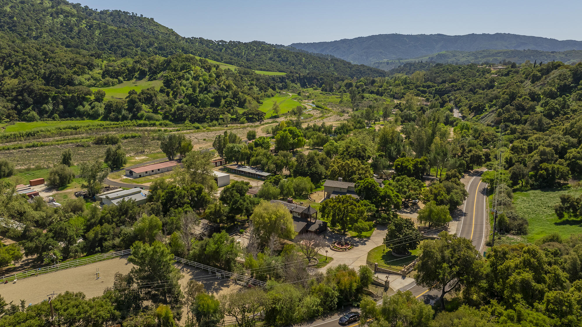 10480 Creek Road Oak View, CA 93022 - Photo 50 of 52 a view of a lush green hillside and houses