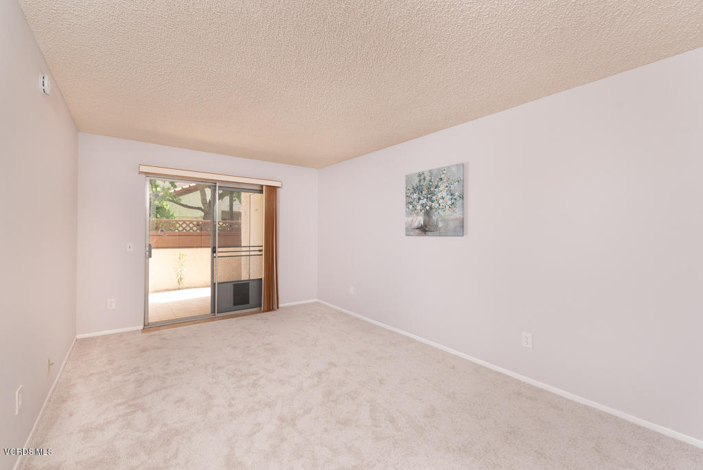 1730 Sinaloa Road, Unit 312 Simi Valley, CA 93065 - Photo 14 of 24 an empty room with windows