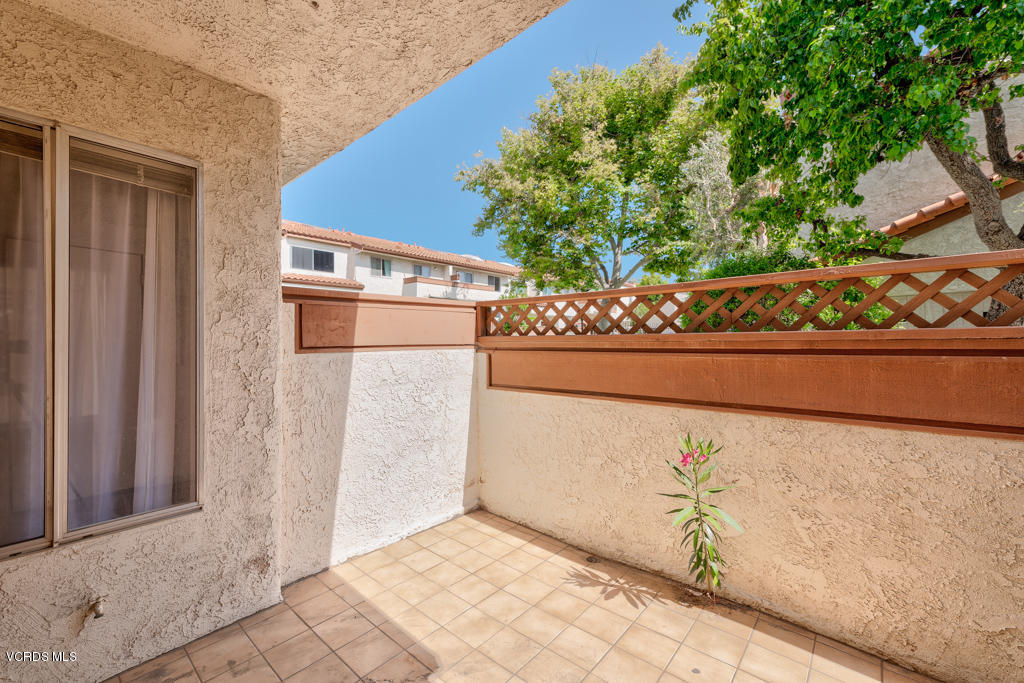 1730 Sinaloa Road, Unit 312 Simi Valley, CA 93065 - Photo 18 of 24 a view of a wooden door