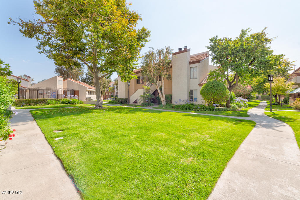 1730 Sinaloa Road, Unit 312 Simi Valley, CA 93065 - Photo 4 of 24 a view of a backyard with a garden