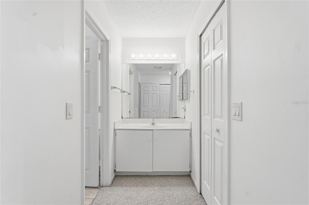 5930 Foxtail Way Fort Pierce, FL 34982 - Photo 16 of 47 a view of a bathroom with closet area