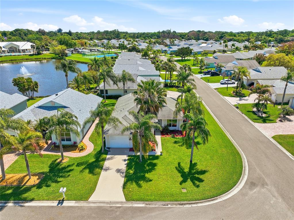 5930 Foxtail Way Fort Pierce, FL 34982 - Photo 28 of 47 a view of a lake with a yard