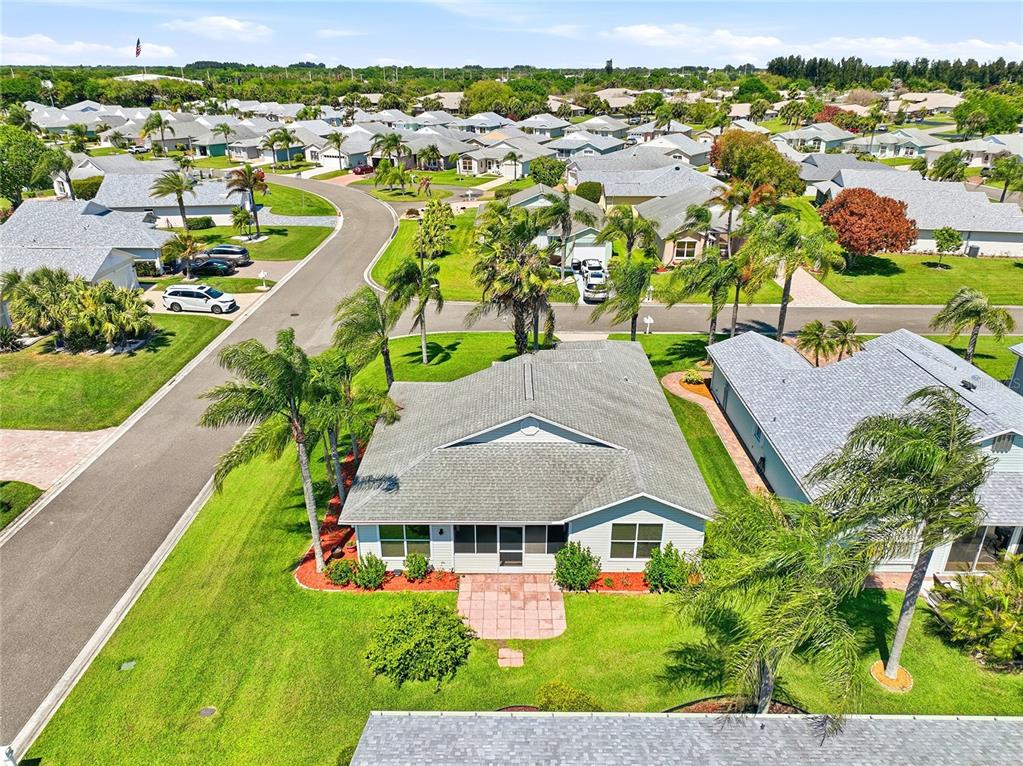 5930 Foxtail Way Fort Pierce, FL 34982 - Photo 32 of 47 an aerial view of residential houses and outdoor space