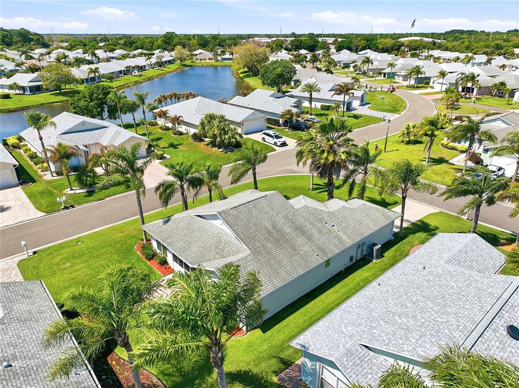 5930 Foxtail Way Fort Pierce, FL 34982 - Photo 33 of 47 an aerial view of residential houses with outdoor space and street view