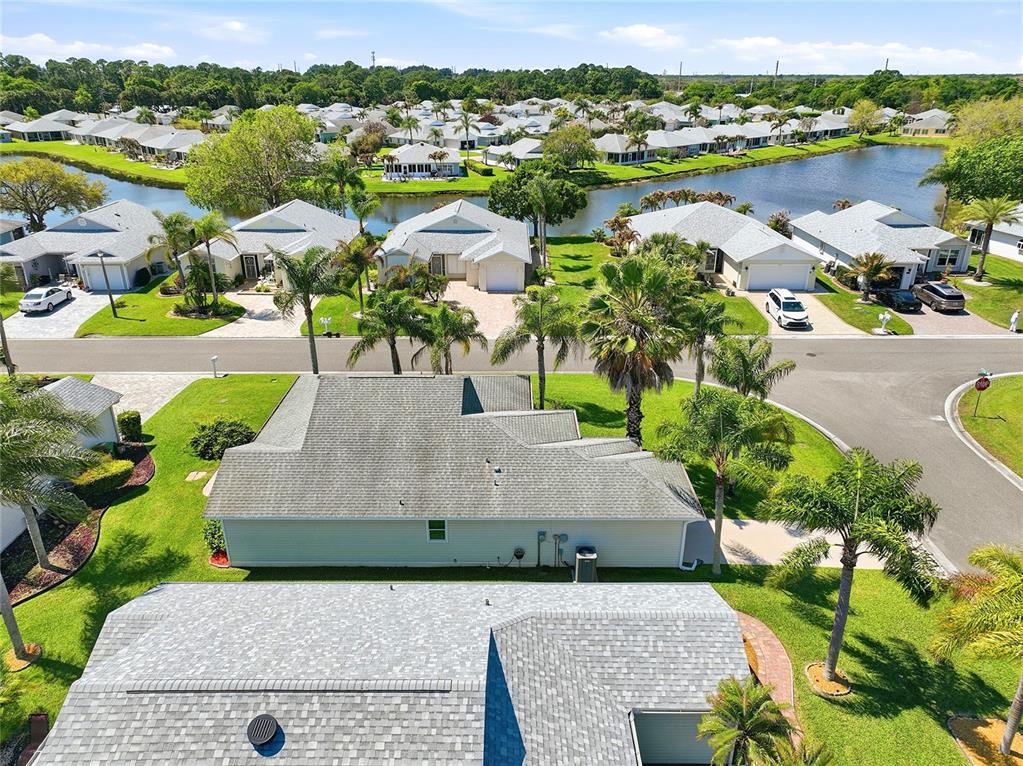 5930 Foxtail Way Fort Pierce, FL 34982 - Photo 34 of 47 an aerial view of a house with outdoor space and lake view