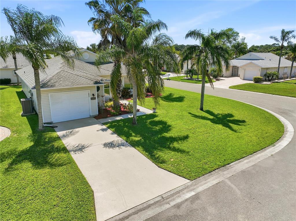 5930 Foxtail Way Fort Pierce, FL 34982 - Photo 35 of 47 a view of a backyard with palm trees